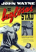 Tall in the Saddle 1944 movie poster John Wayne